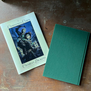 classic Christmas Tale, vintage children's chapter book - A Christmas Carol written by Charles Dickens with illustrations by Mark Summers, a 2003 Barnes & Noble Edition - view of the back cover - plain green clothbound