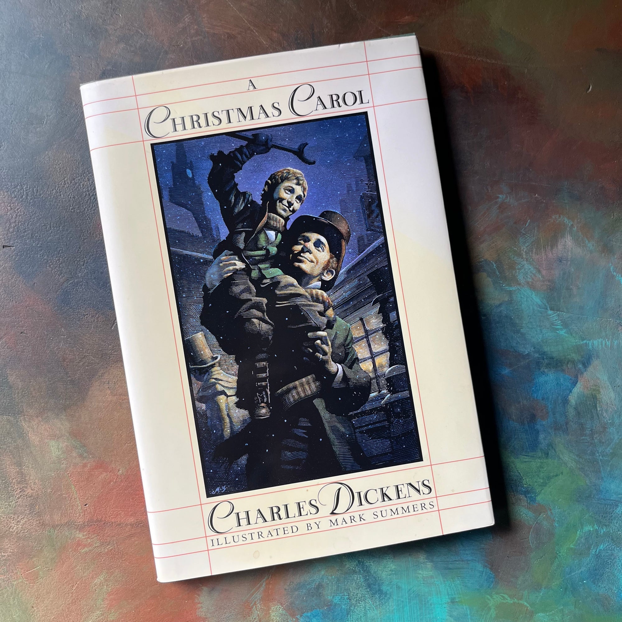 Dicken's Famous A Christmas Carol[-written by Charles Dicken's with illustrations by Mark Summers-Barnes & Noble Edition-dust jacket's front cover with an illustration of Scrooge holding Tiny Tim