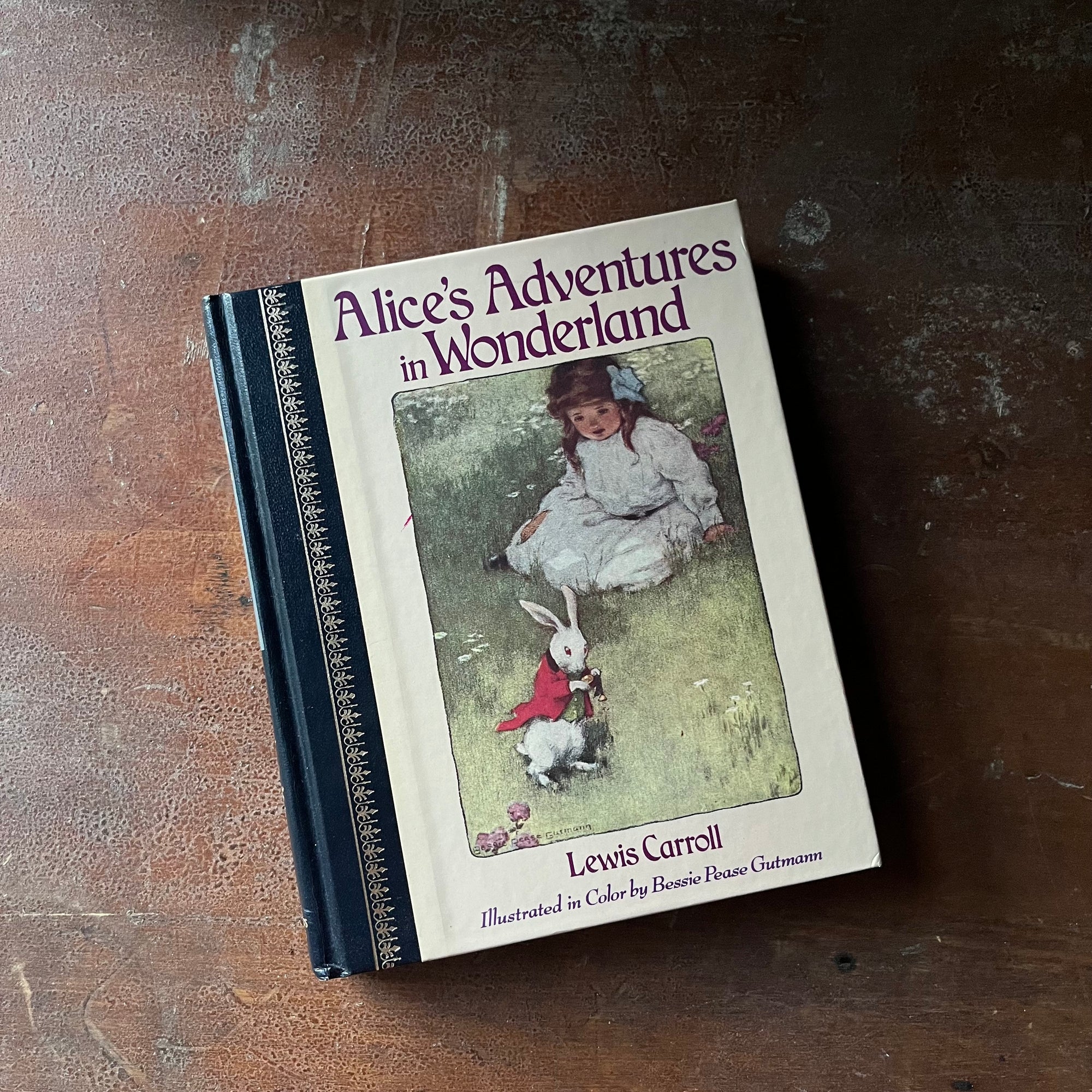 vintage children's classic story - Alice's Adventures in Wonderland written by Lewis Carroll with illustrations by Bessie Peace Gutmann & John Tenniel, Children's Classics Edition - view of the front cover