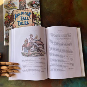 American Tall Tales written by Mary Osborne Pope with wood engravings by Michael McCurdy-American Folktales-folktales for children-colorful illustrations-homeschool library must-have-view of the illustrations