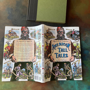 American Tall Tales written by Mary Osborne Pope with wood engravings by Michael McCurdy-American Folktales-folktales for children-colorful illustrations-homeschool library must-have-view of the outside of the dust jacket