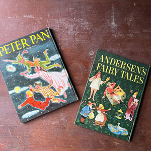 vintage children's picture books in large format:  Peter Pan adapted by Phoebe Wilson with Illustrations by Ruth Wood & Andersen's Fairy Tales Retold by Rose Dobbs with Illustrations by Gustav Hjortlund - view of their back covers with the same image as the front just in reverse