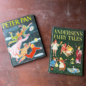 vintage children's picture books in large format:  Peter Pan adapted by Phoebe Wilson with Illustrations by Ruth Wood & Andersen's Fairy Tales Retold by Rose Dobbs with Illustrations by Gustav Hjortlund - view of their glossy front covers with illustrations from each book