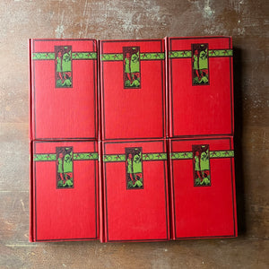 antique book set in red and green - Classic American Literature Book Set Written by Louisa May Alcott - Little Women, Little Men, Jo's Boys, Eight Cousins, Rose in Bloom and An Old-Fashioned Girl - cover art by Anna Bond - view of the decorative front covers