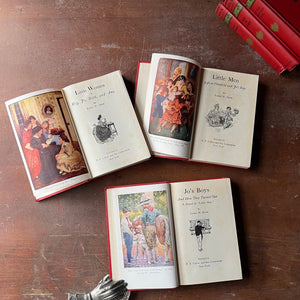 antique book set in red and green - Classic American Literature Book Set Written by Louisa May Alcott - Little Women, Little Men, Jo's Boys, Eight Cousins, Rose in Bloom and An Old-Fashioned Girl - cover art by Anna Bond - view of the title pages with full color illustrations opposite