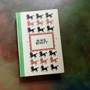Black Beauty written  by Anna Sewell with illustrations by Walter Seaton-junior deluxe editions book club book-classic children's book-view of the embossed front cover
