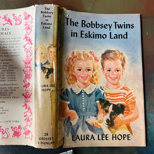 Bobbsey Twins Mysteries Three Books Set with Dust Jackets-Laura Lee Hope-vintage children's chapter books-young reader mysteries-view of the tape used to repair the tear to the dust jacket of In Eskimo Land