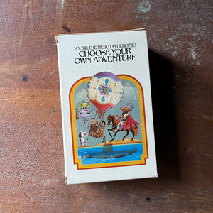 vintage children's chapter books, nostalgic books from the 1980's, 1980's childhood - Choose Your Own Adventure Box Set Volumes 1 - 6:  The Cave of Time, Journey under The Sea, By Balloon to the Saraha, Space and Beyond, The Mystery of Chimney Rock and Your Code Name is Jonah - view of the side of the box sleeve