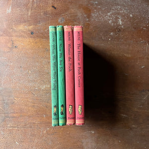 Classic A. A. Milne Book Set-When We Were Very Young, Now We Are Six, Winnie the Pooh, and The House at Pooh Corner written by A. A. Milne with illustrations by Ernest H. Shepard - view of the spines