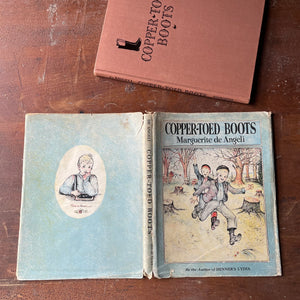 Copper-Toed Boots written & Illustrated by Marguerite de Angeli-1938 Edition with Dust Jacket-Autographed Edition-vintage picture book-view of the outside of the dust jacket - front & back