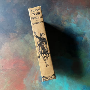 Frank on the Prairie by Harry Castlemon-1893 The John C. Winston Co.-antique adventure book for boys-vintage children's chapter book-view of the spine with Frank riding a horse