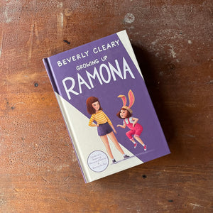 Growing Up Ramona written by Beverly Cleary is a two volume book featuring:  Ramona & Beezus and Ramona the Pest - view of the front cover with an illustration of Ramona with rabbit ears and her sister Beezus-first edition