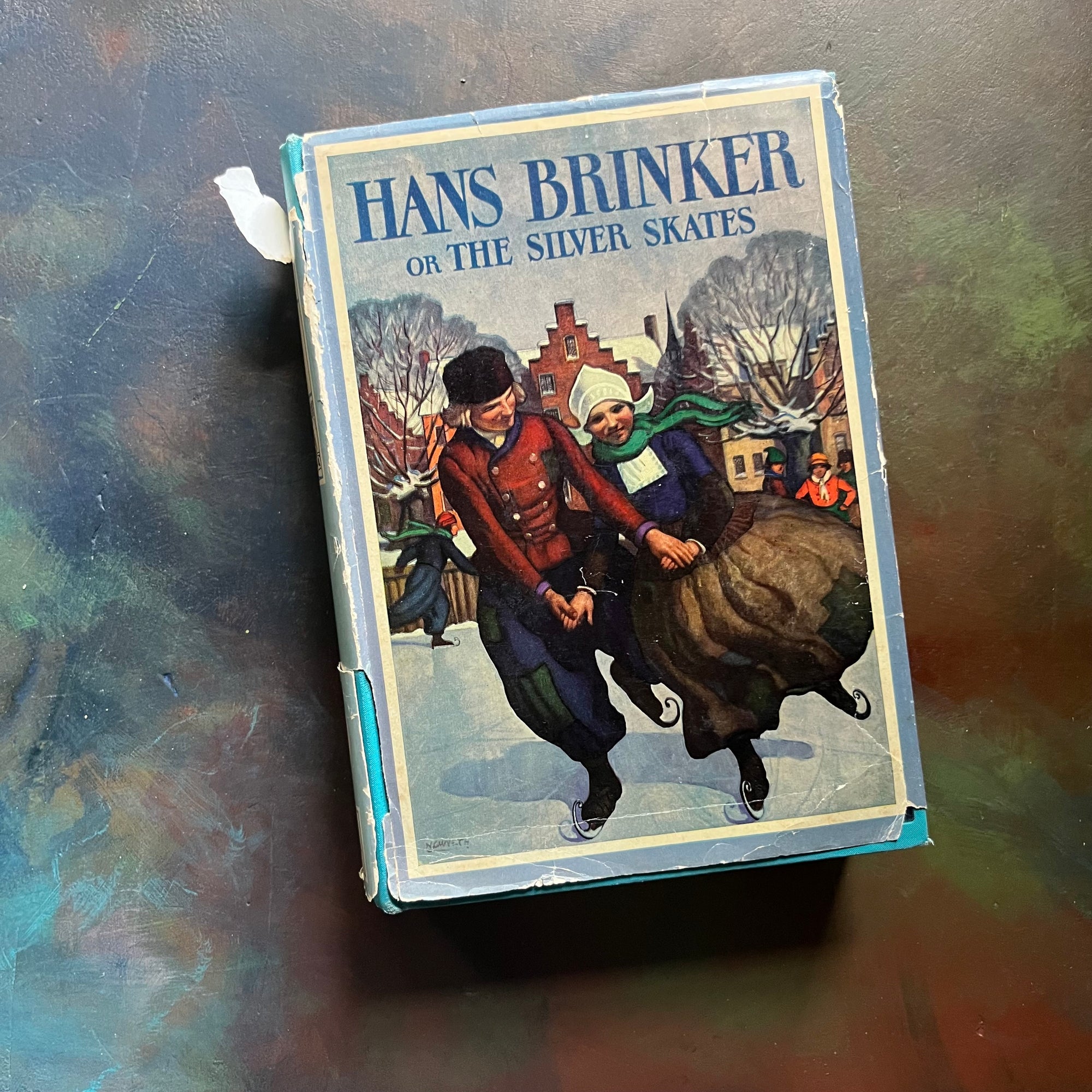 Hans Brinker or the Silver Skates by Mary Mapes Dodge with illustrations by N. C. Wyeth & Peter Hurd-antique children's chapter book-view of the dust jacket's front cover