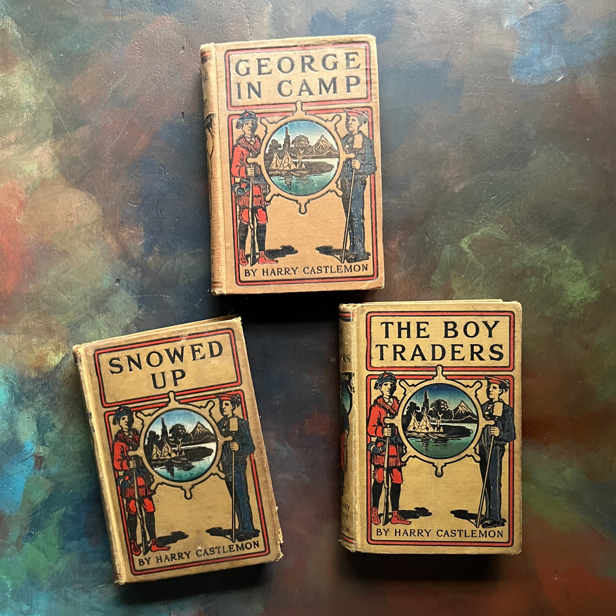 Harry Castlemon Trio of Antique Books-The Boy Traders, Snowed Up, George in Camp-antique children's chapter books-adventure books for boys-view of the embossed front covers