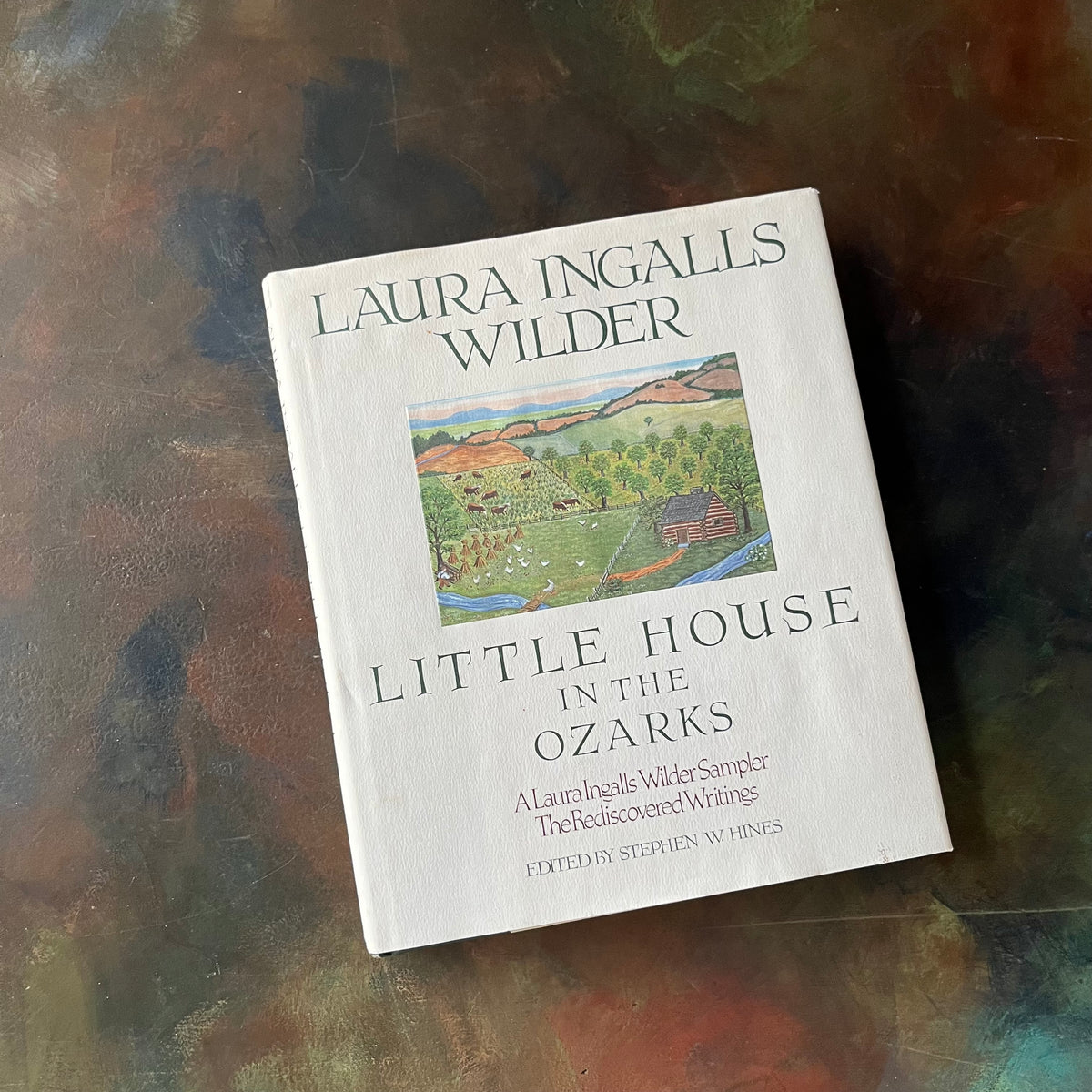 Little House in the Ozarks: A Laura Ingalls Wilder Sampler The Rediscovered Writings-Edited by Stephen W. Hines-writings of Laura Ingalls Wilder-biography-view of the dust jacket's front cover