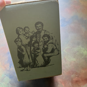 Little House on the Prairie Box Set in Blue written by Laura Ingalls Wilder with Illustrations by Garth Williams-vintage children's chapter books-view of the side of the box with the Ingalls family along with grandparents & cousins from Little House in the Big Woods