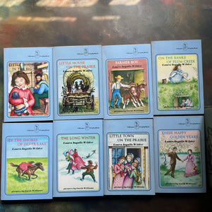 Little House on the Prairie Box Set in Blue written by Laura Ingalls Wilder with Illustrations by Garth Williams-vintage children's chapter books-view of the front covers