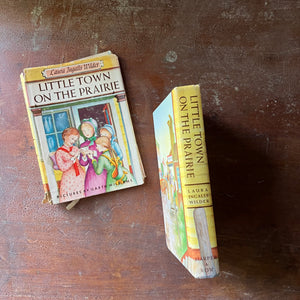 vintage children's chapter book-Newbery Honor Book - Little Town on the Prairie with dust jacket written by Laura Ingalls Wilder with illustrations by Garth Williams - view of the spine