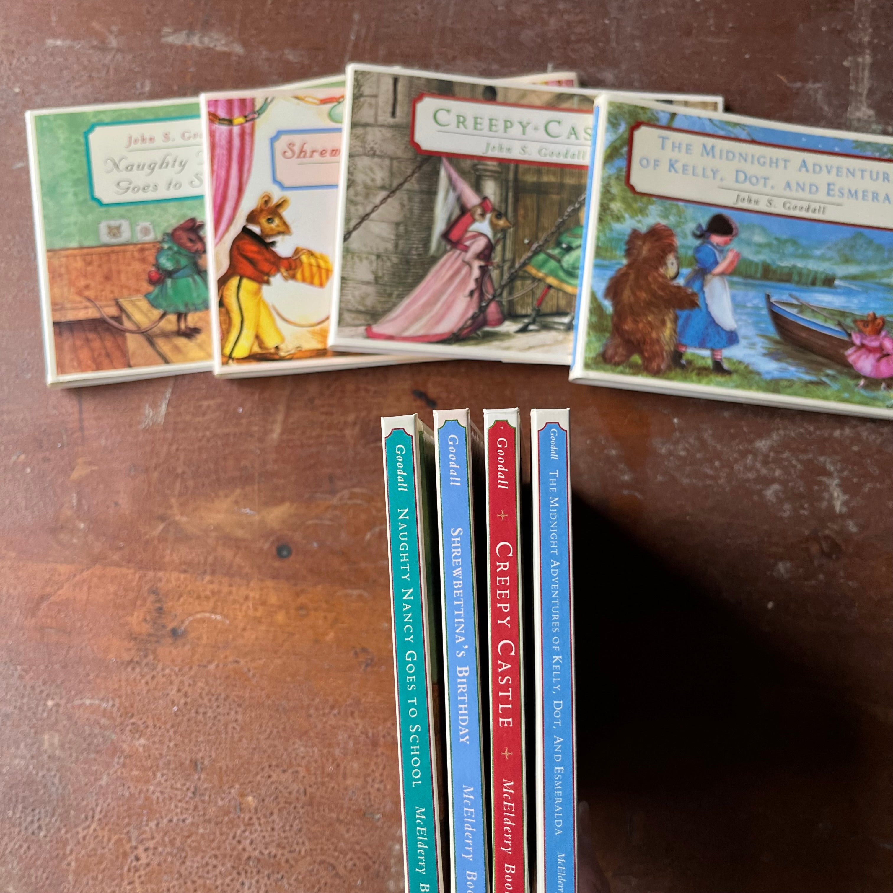 Lot of Four John S. Goodall Books-1999-Naughty Nancy Goes to School-Creepy Castle-Shrebettina's Birthday-The Midnight Adventures of Kelly, Dot, and Esmeralda-view of the spines