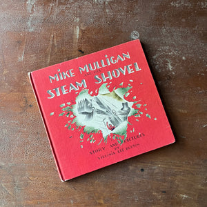 Mike Mulligan and his Steam Shovel Written & Illustrated by Virginia Lee Burton-Weekly Reader Children's Book-vintage children's picture book-view of the front cover with Mike & his steam shovel busting through the red cover