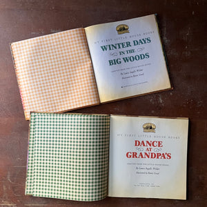 vintage picture books from Scholastic Inc. - My First Little House Books Set:  Winter Days in the Big Woods and Dance at Grandpa's written by Laura Ingalls Wilder with illustrations by Renee Graef - view of the title pages