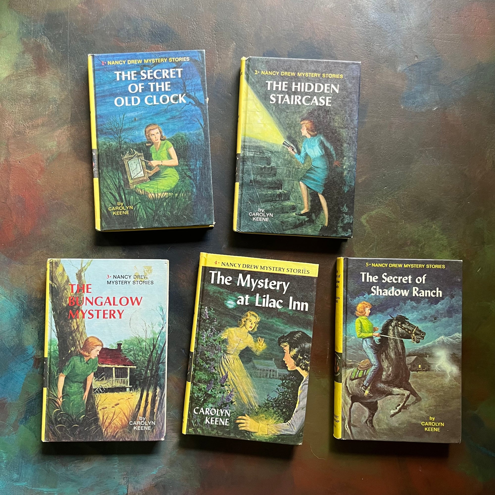 Nancy Drew Mystery Stories Starter Book Set Volumes 1-5 written by Carolyn Keene-vintage mystery books for girls-view of the front covers