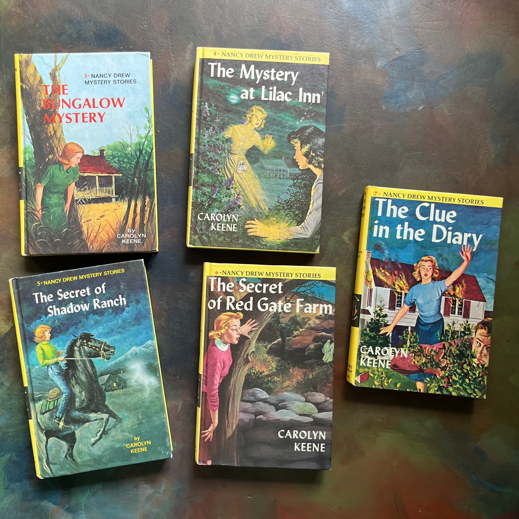 Nancy Drew Mystery Stories Starter Set-Books Three through Seven-vintage children's chapter books-Carolyn Keene-view of the front covers