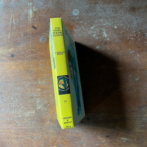 vintage children's chapter book, adventure book for girls, Nancy Drew Mystery Stories - #14 The Whispering Statue written by Carolyn Keene - view of the spine