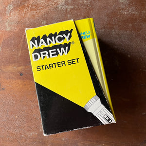 vintage children's chapter books, vintage book set - Nancy Drew Starter Set in Box Sleeve by Carolyn Keene-Volumes 1-6 - view of the side of the box sleeve in yellow & black.