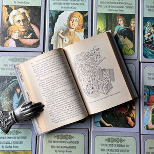Nancy Drew Twin Thrillers Book Set of 15 by Carolyn Keene-vintage children's chapter books-mysteries-view of the black & white illustrations found in each volume