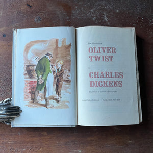 Junior Deluxe Editions Book, vintage children's chapter book - Oliver Twist written by Charles Dickens with illustrations by Lawrence Beall Smith - view of the title page