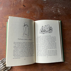 vintage children's chapter book - Paddington Takes Air written by Michael Bond with illustrations by Peggy Fortnum - view of the illustrations within the pages