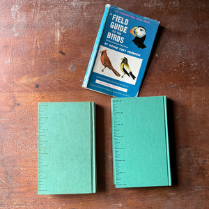 vintage nature guides - Pair of Peterson Field Guides-Field Guide to the Birds & Field Guide to Wildflowers - view of the back covers with the ruler on the left-hand side of each book
