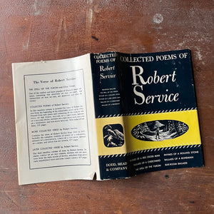 Pair of Robert Service Books-The Spell of the Yukon and Other Verses and Collected Poems of Robert Service-vintage poetry books from the Canadian Yukon-view of the outside of the dust jacket