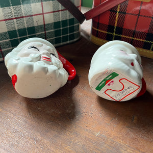 Pair of vintage santa mugs-winking santa mug - view of the bottom of the mugs