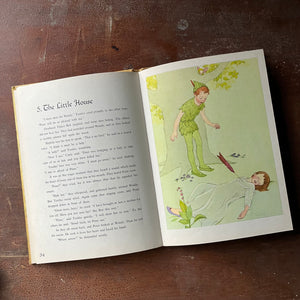 vintage children's chapter book, J. M. Barrie's Peter Pan & Wendy - Peter Pan a 1957 Edition Edited by Josette Frank with illustrations by Marjorie Torrey - view of the full-page color illustrations