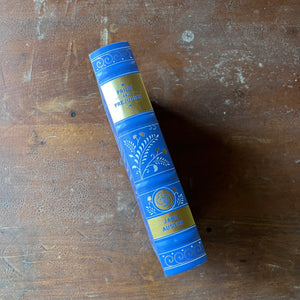 Pride and Prejudice written by Jane Austen-2011 Barnes & Noble Edition-classic literature in a modern edition-view of the spine in blue, gold & white design