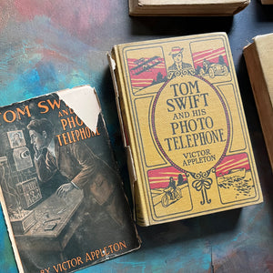 Set of 5 Tom Swift Antique Books written by Victor Appleton-adventure books for boys-view of the dust jacket for Tom Swift and His Photo Telephone