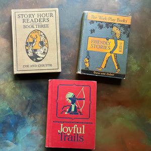 Set of Three Vintage School Readers-Joyful Trails-Story Hour Readers Book Three-The Work-Play Books Friendly Stories-antique school books-view of the front covers with images of Native Americans on each one