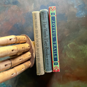 Set of Three Vintage School Readers-Joyful Trails-Story Hour Readers Book Three-The Work-Play Books Friendly Stories-antique school books-view of the spines