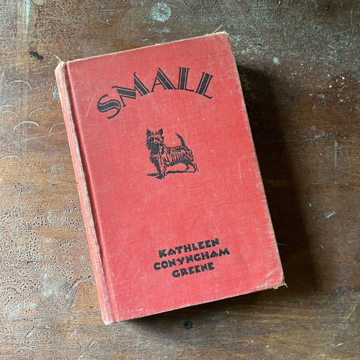 vintage children's chapter book, vintage books about dogs, dog story - Small Written by Kathleen Conyngham Greene with illustrations by EC. B. Falls 1936 Edition - view of the embossed front cover with an image of Small the dog on it