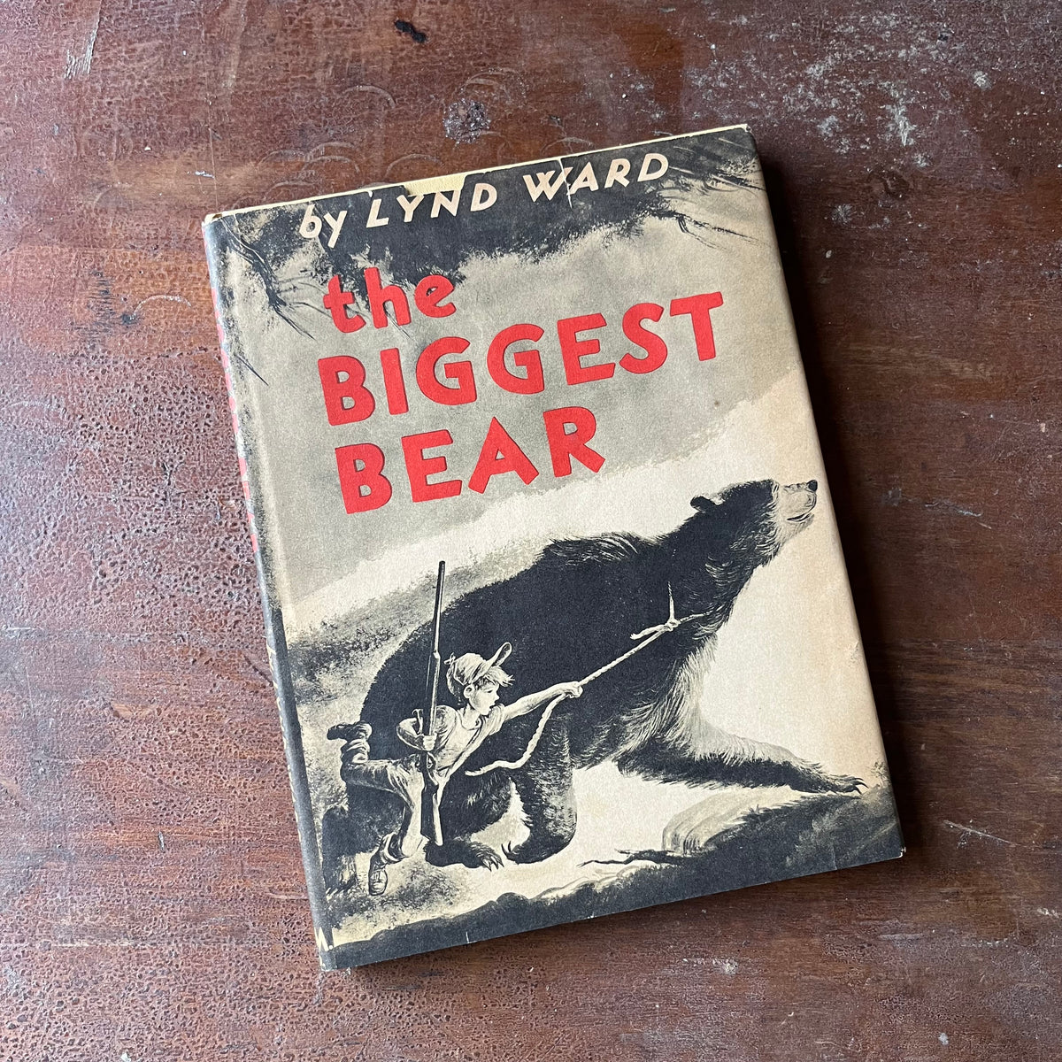 vintage children's picture book, Weekly Reader Children's Book Club Edition, Caldecott Award Winner - The Biggest Bear story and pictures by Lynd Ward - view of the dust jacket's front cover