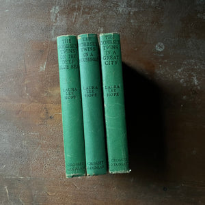 antique children's books , vintage children's chapter books, collectible books - The Bobbsey Twins Book Set-On The Deep Blue Sea, In a Great City and On a Houseboat written by Laura Lee Hope - view of the spines