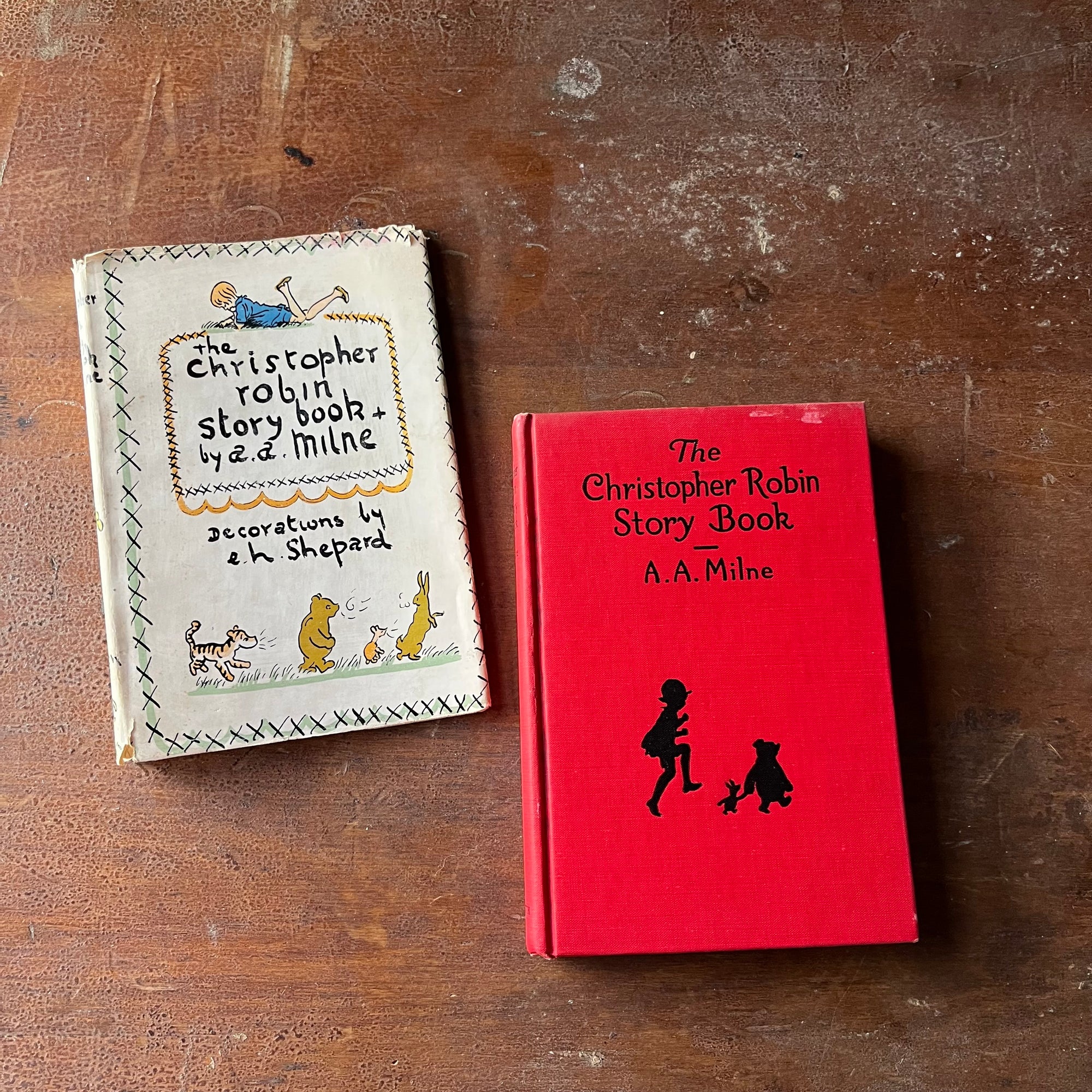 vintage children's story book - The Christopher Robin Story Book written by A. A. Milne with Decorations (illustrations) by E. H. Shepard - hardcover edition with dust jacket - view of the embossed front cover with Christopher Robin, Winnie the Pooh and Piglet along with title & author listed