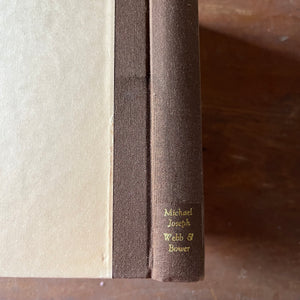 vintage nature sketchbook & diary - The Country Diary of An Edwardian Lady written & illustrated by Edith Holden - view of the condition of the spine - slight watermark noticeable at the bottom