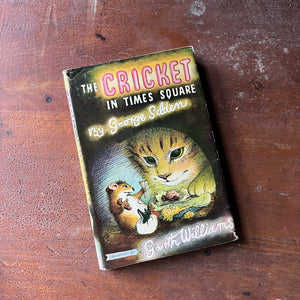vintage children's chapter book, Newbery Honor Book - The Cricket of Times Square written by George Shelden with illustrations by Garth Williams - view of the dust jacket's front cover with an illustration of a cat, mouse & cricket depicted