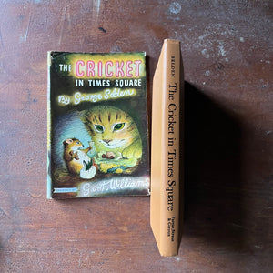 vintage children's chapter book, Newbery Honor Book - The Cricket of Times Square written by George Shelden with illustrations by Garth Williams - view of the spine with the name & author's last name written down it