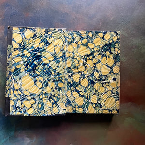 The Deerslayer or The War Path written by James Fenimore Cooper-book five of the leather stocking tales-antique leather-bound book with marbled cover-vintage adventure book for boys-view of the inside cover in yellow & blue marbled design