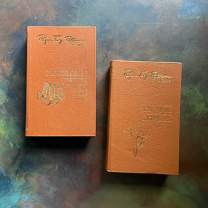 The Easton Press 50th Anniversary Leatherbound Editions-Peterson Field Guides-Pacific Coast Fishes and Pacific Shells-vintage nature books-view of the leatherbound covers with gold embossing