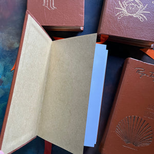 The Easton Press 50th Anniversary Leatherbound Editions-Peterson Field Guides-Set of Five-Atlantic Shores, Shells, Coral Reefs, & Fishes-view of the inside covers